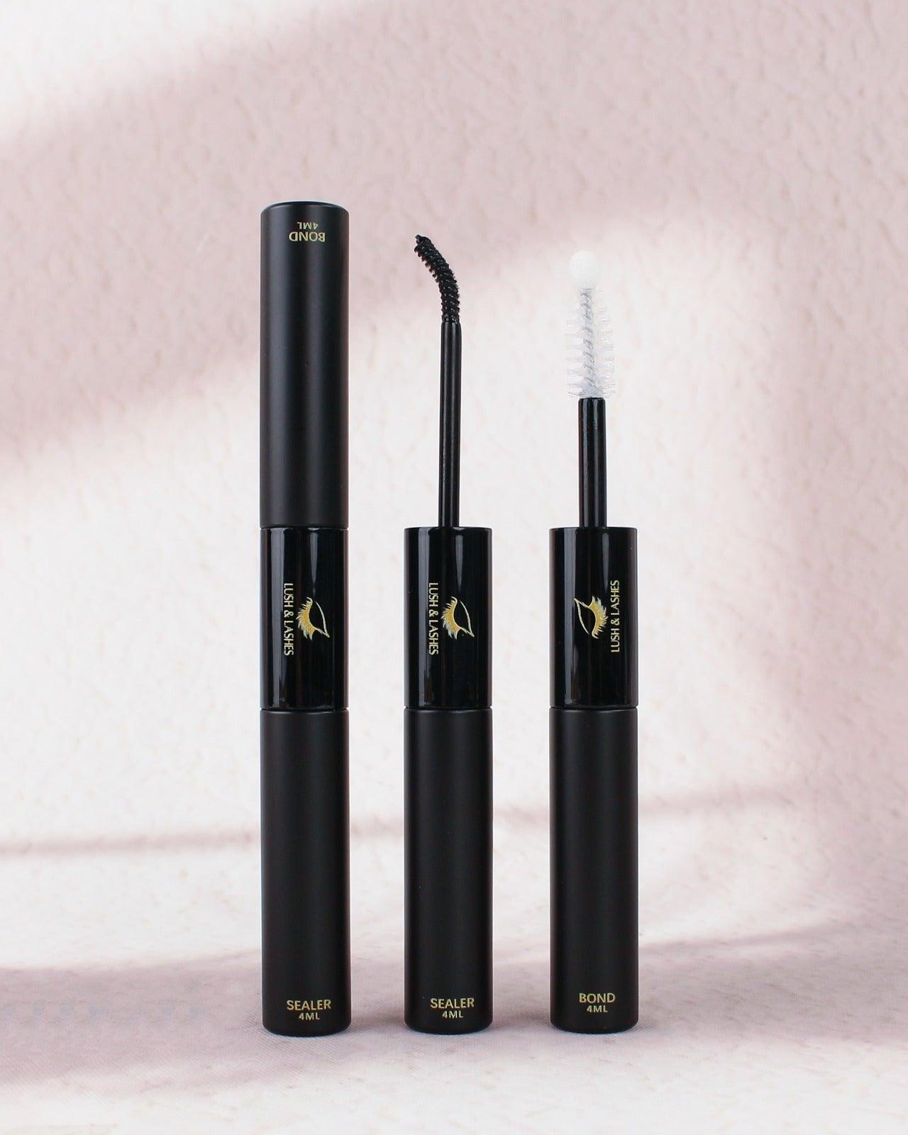 a pair of mascaras sitting next to each other